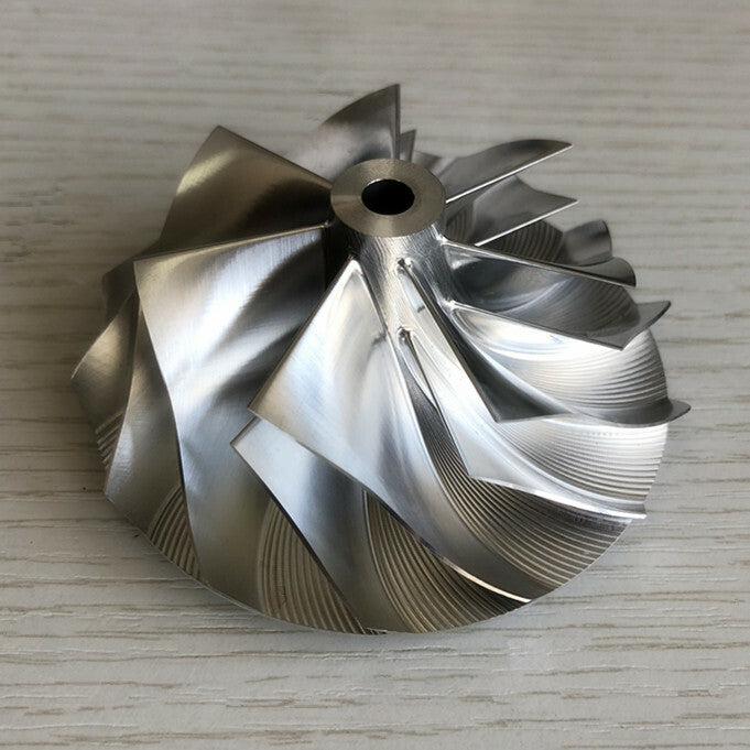 T04E 62.45/82.36 mm 7+7 Blade Turbine Blank Compressor Wheel