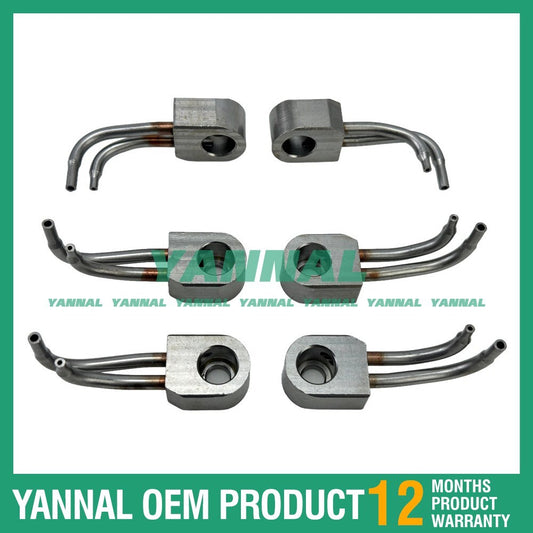 6 oil cooling nozzles, part numbers 2266478 and 2767222, for Caterpillar C11 engines.
