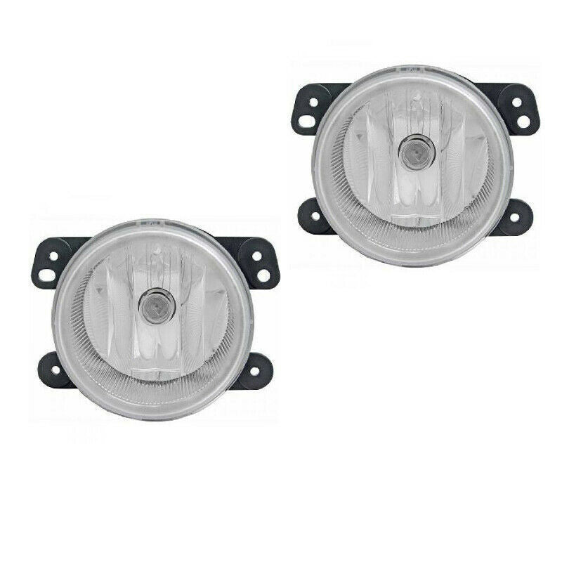 A pair of traveling Wranglers, Cheaokee, 2010-2017, driving with fog lights.