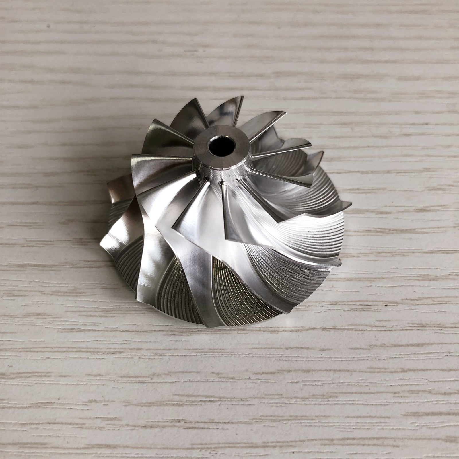 K04 34.53/50.96 mm 11+0 Blade Turbine Milling/Blank Compressor Wheel