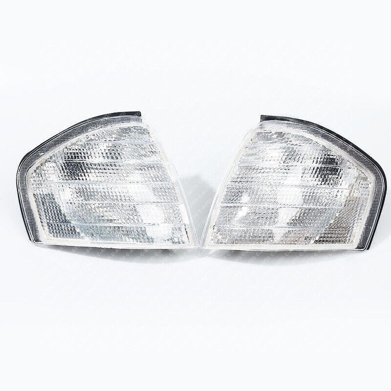 A pair of dual turn signal light bracket covers for 1994-2000 for Mercedes-Benz C-Class W202.