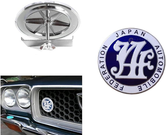 The blue badge on the front of the car grille belongs to the Japan Automobile Federation and is applicable to for Mazda .